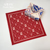 PanPan Super Lucky red patterned towel folded beside the character towel collection